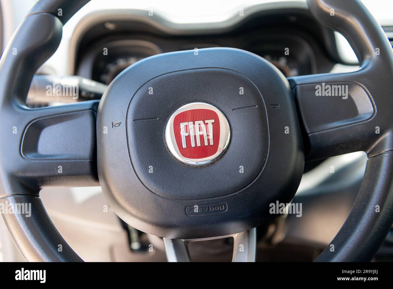 Lefkada island. Greece- 06.17.2023. The name badge on the car steering wheel of the Italian auto marker Fiat. Stock Photo