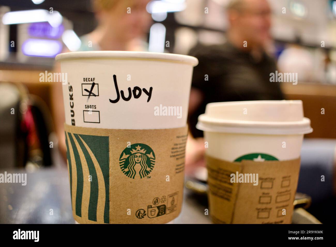 Starbucks coffee cups with customer's name, Judy Stock Photo Alamy