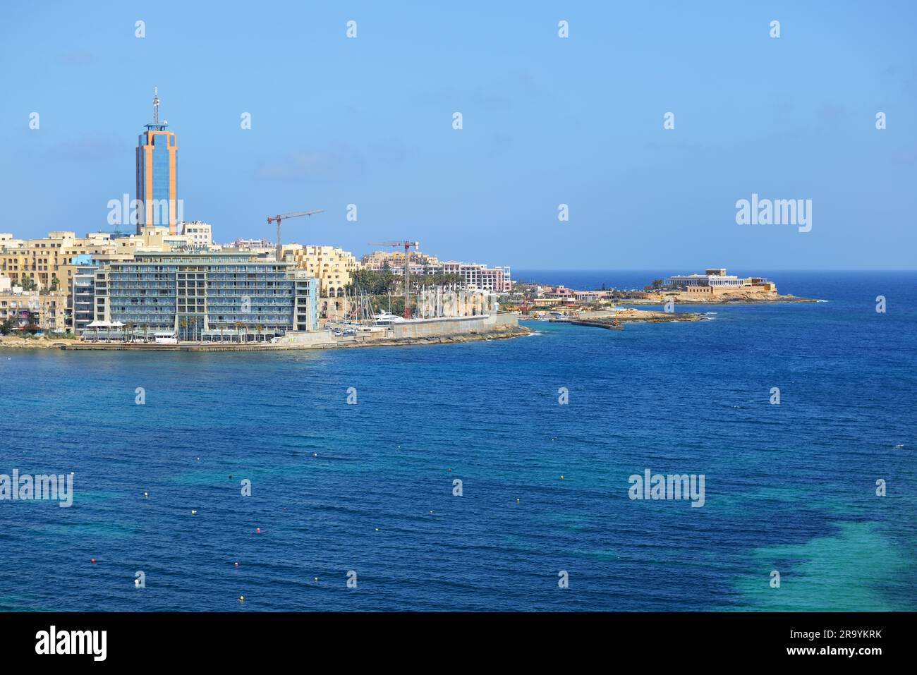 SLIEMA, MALTA - APRIL 21: The view on hotels and beach on April 21, 2015 in Sliema, Malta. More then 1,6 mln tourists is expected to visit Malta in ye Stock Photo