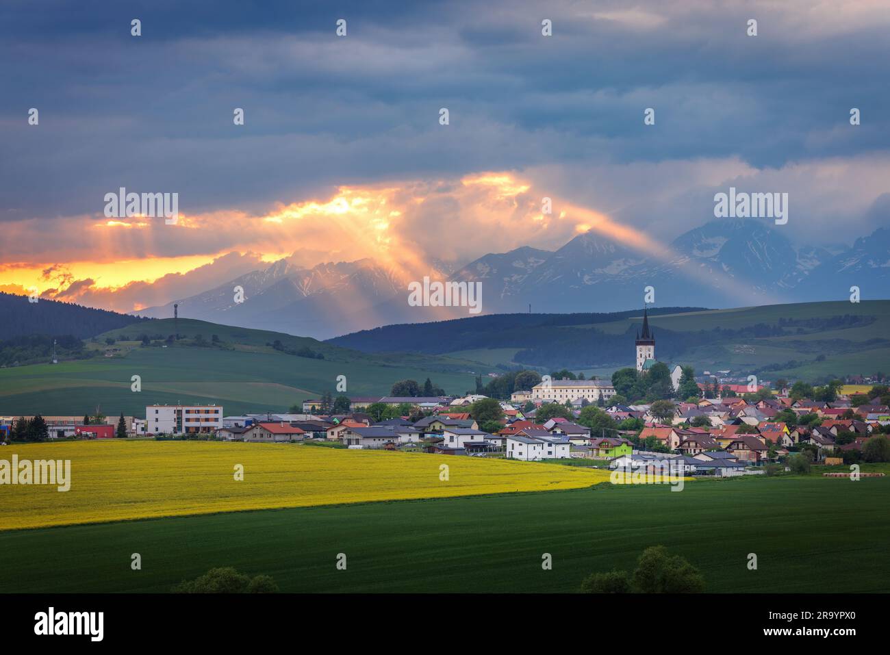 Spissky Stvrtok is a village and municipality in Levoca District in the Presov Region of central-eastern Slovakia. High Tatras on background Stock Photo