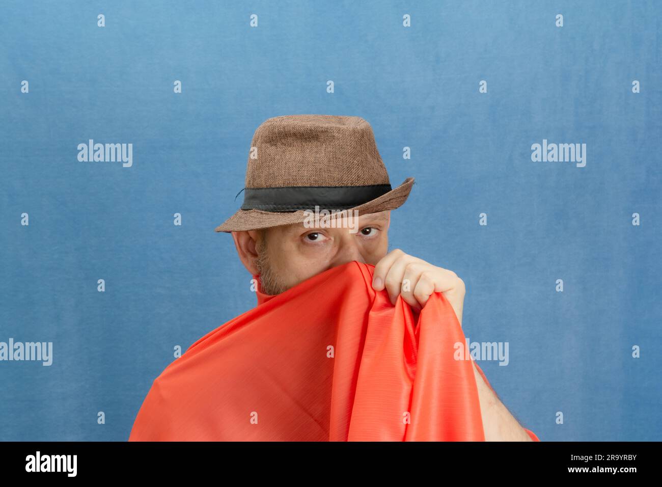 Man with hat covering face hi-res stock photography and images - Alamy