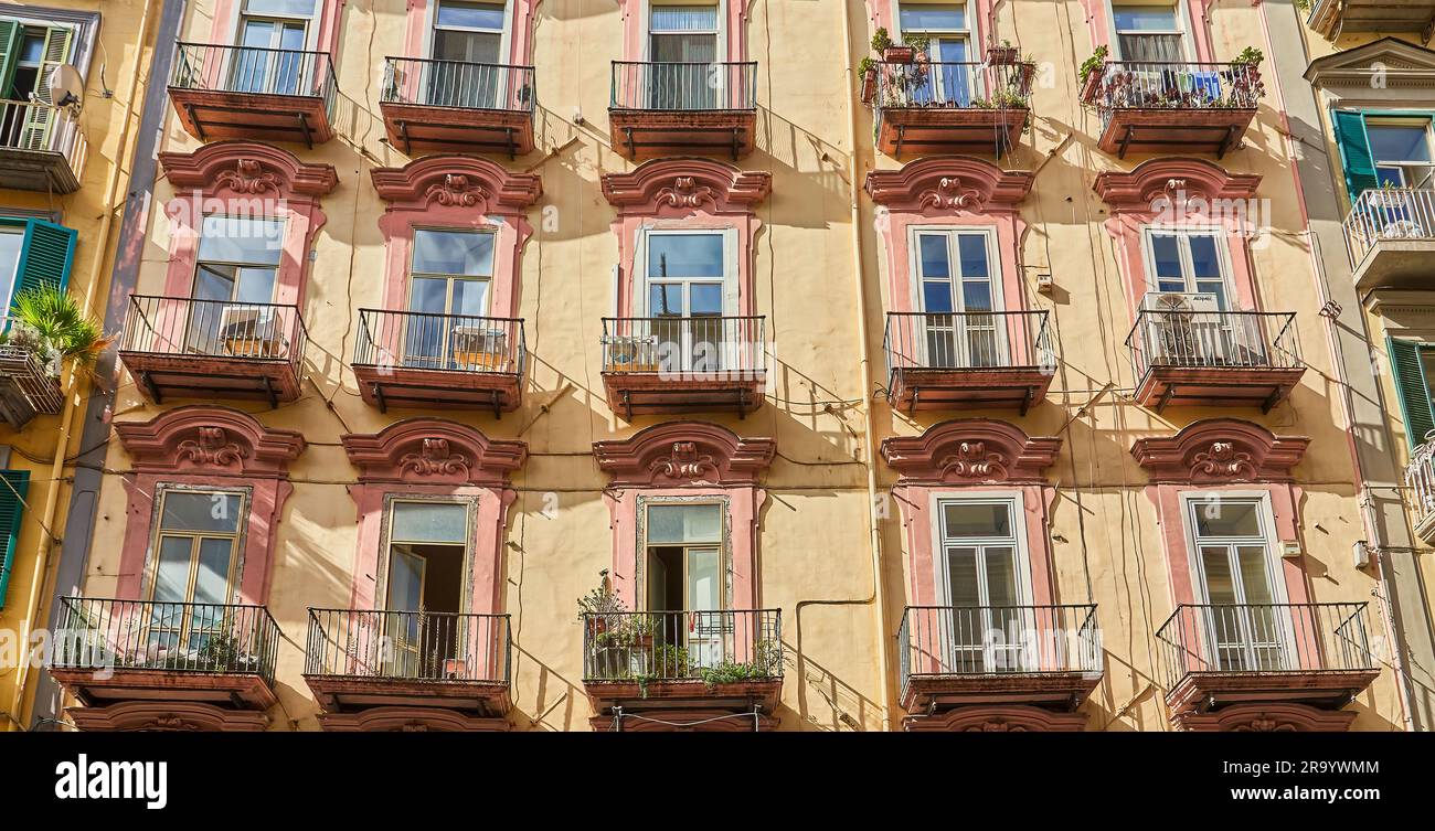 Facade of a classic building in the historical center of Naples, Italy ...