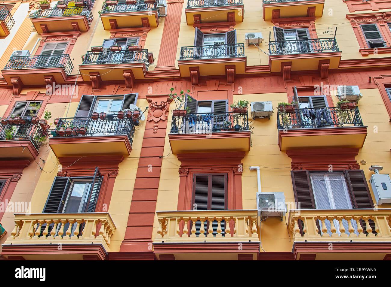 Facade of a classic building in the historical center of Naples, Italy ...