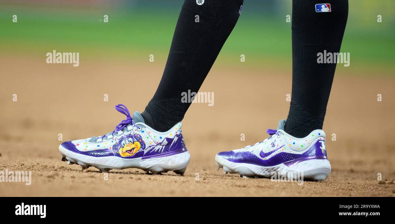 Colorado Rockies left fielder Jurickson Profar (29) wears a pair