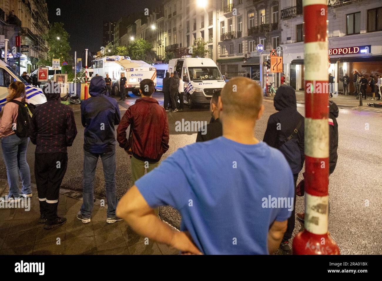 Brussels, Belgium. 29th June, 2023. People look on, at the site of ...