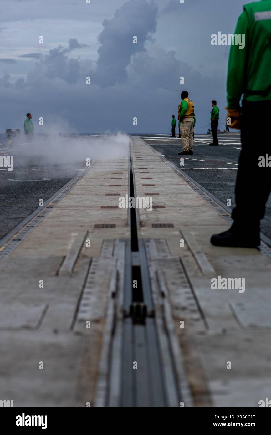 Sailors aboard the Nimitz-class aircraft carrier USS George Washington (CVN 73) test the catapult while underway in the Atlantic Ocean, June 22, 2023. George Washington is underway for flight deck certification, an evaluation of the ships' proficiency to safely launch and recover aircraft. (U.S. Navy photo by Mass Communication Specialist Seaman Keith Knisely) Stock Photo