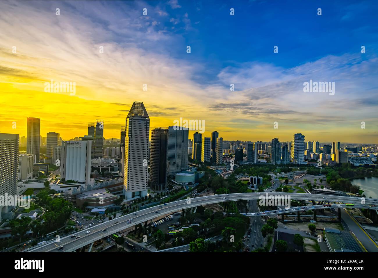 Aerial view of sunset dusk at Singapore Marina Bay city skyline. Stock Photo