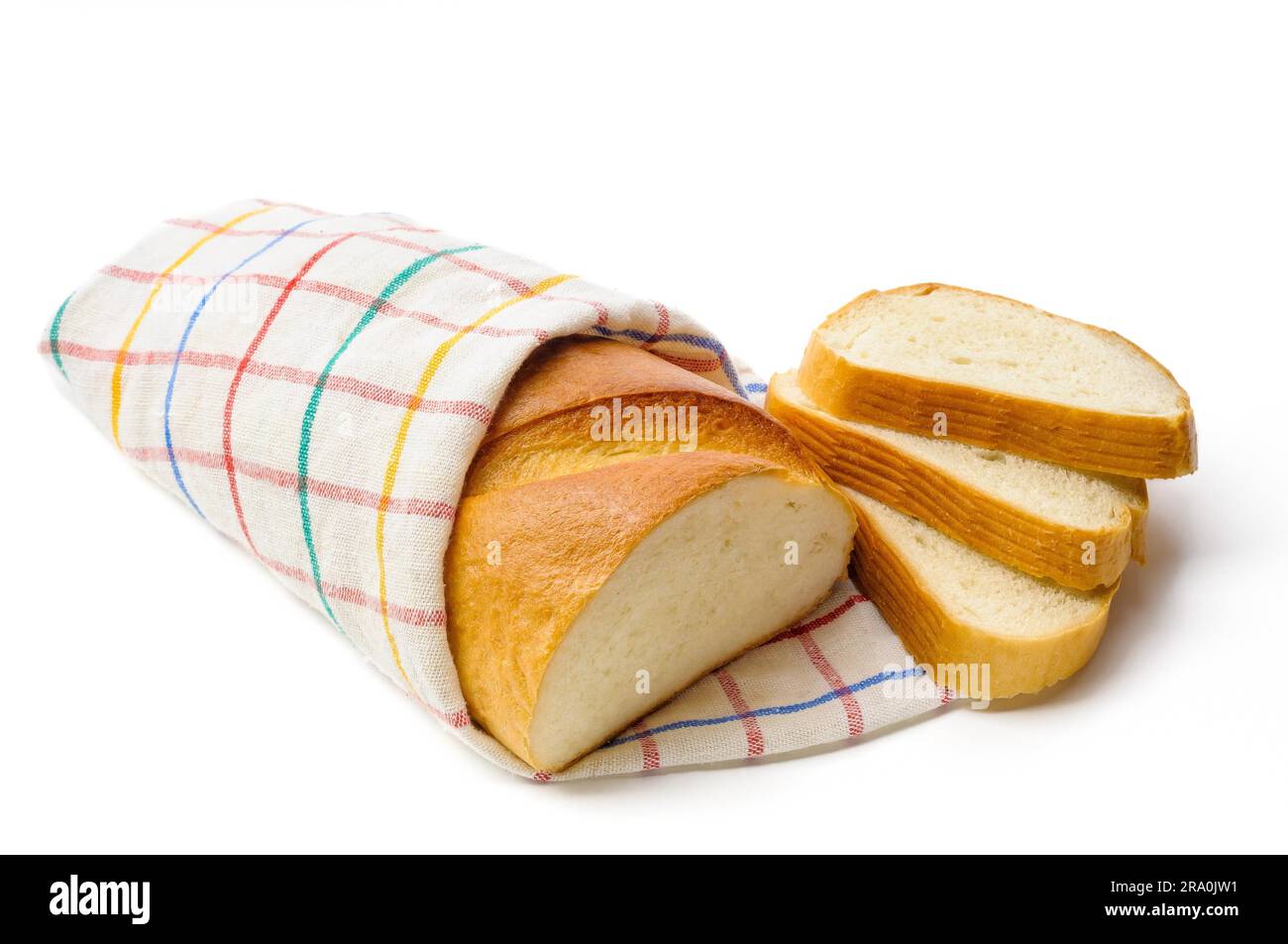 A piece of traditional white bread with three cut slices Stock Photo ...
