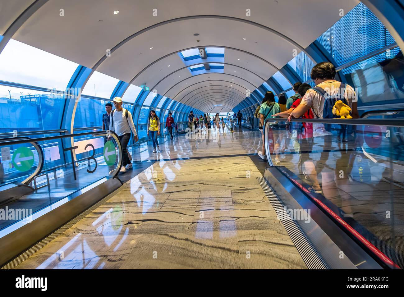 Link way with travelators in Changi Airport, Singapore. Stock Photo