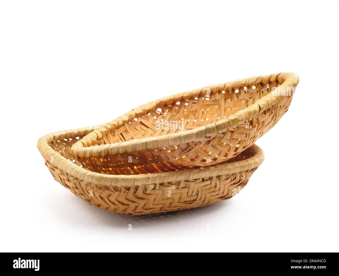 Two little wicker baskets isolated on white background Stock Photo
