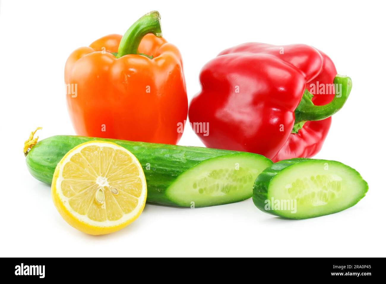 Fresh vegetables fruits (paprika) (cucumber and lemon) isolated on a