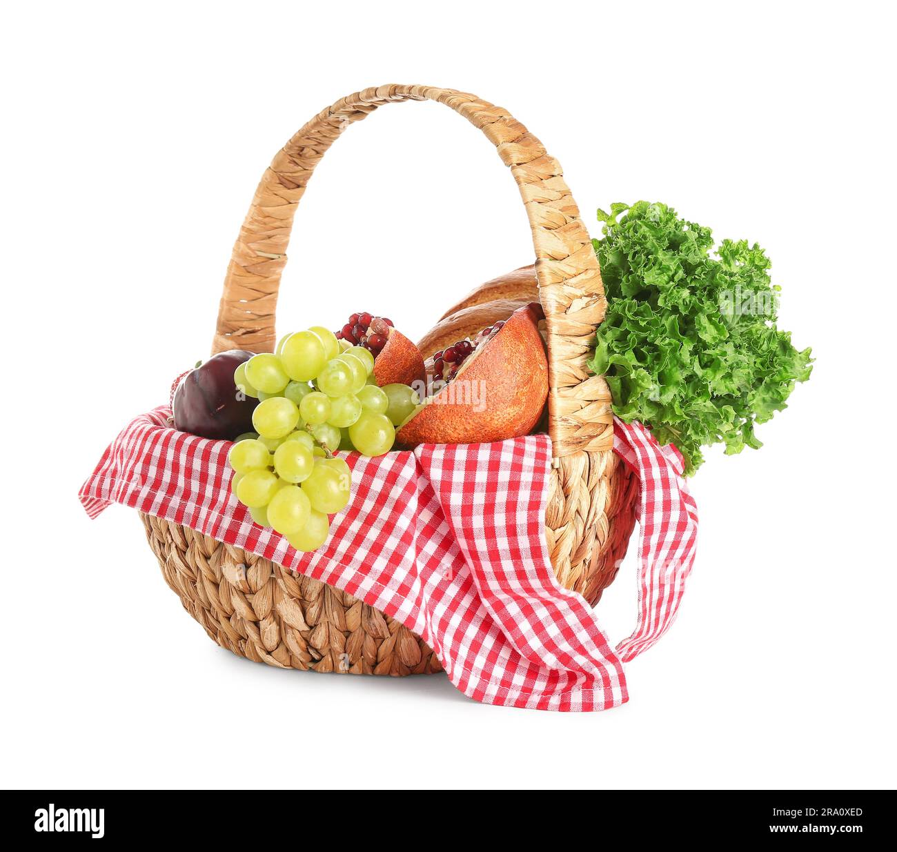 Wicker basket with delicious food for picnic on white background Stock ...