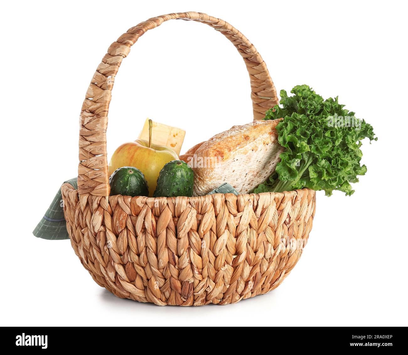 Wicker basket with delicious food for picnic on white background Stock ...