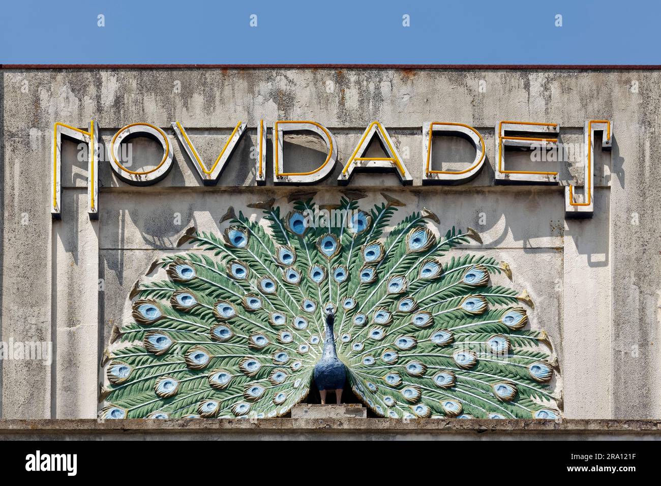 Wheelthrowing peacock, relief on the historic Cunhas department stores