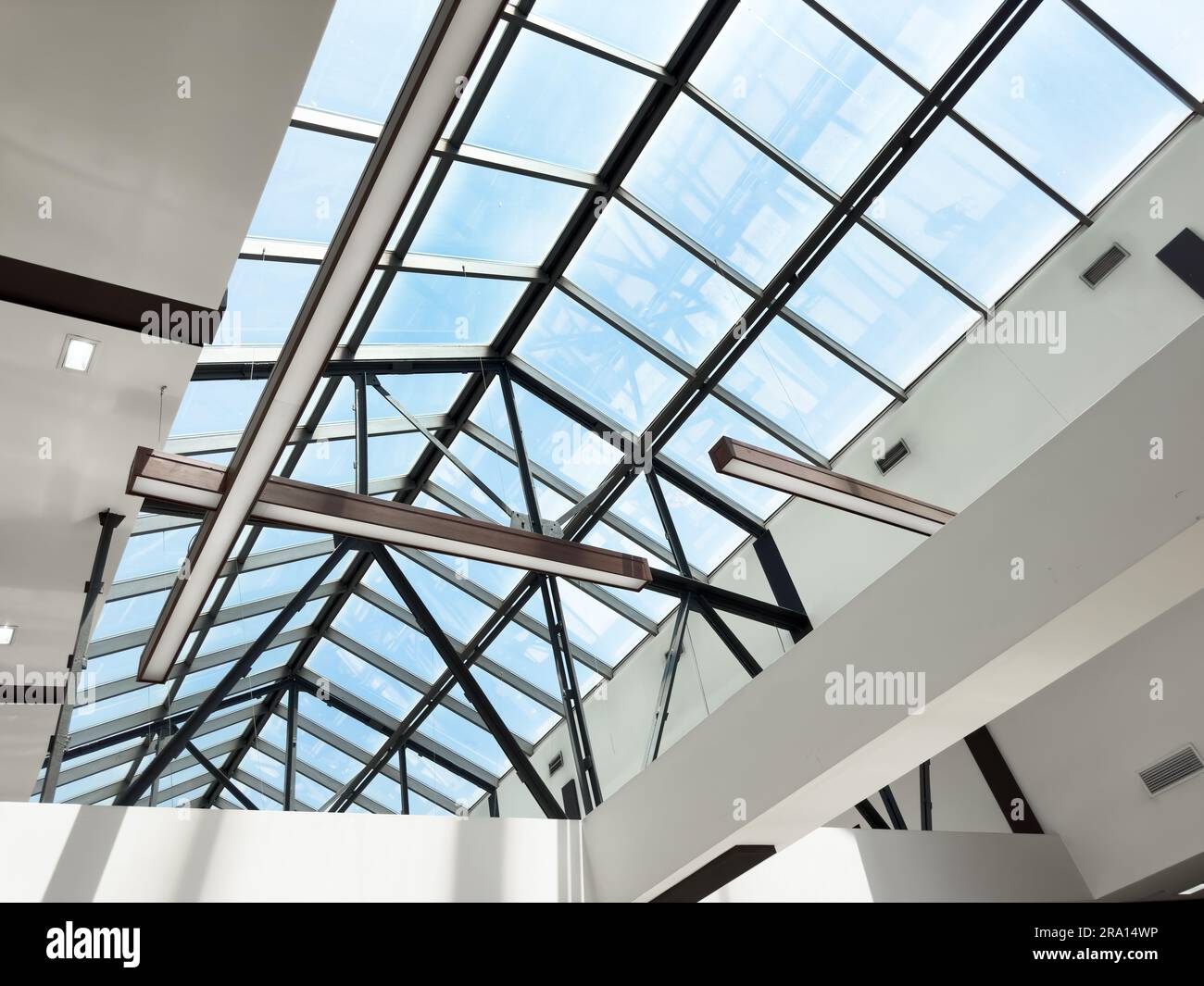 Lights and ventilation system in long line on ceiling of the industrial ...
