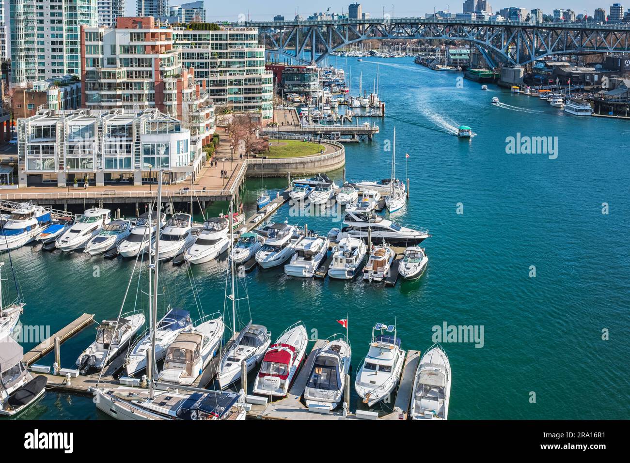 Panoramic aerial view of False creek in Vancouver in a sunny day, Canada. Boats and yachts at the Fisherman Wharf piers in False Creek marina close to Stock Photo