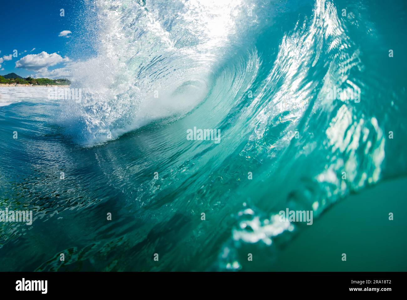Turquoise perfect waves in ocean. Breaking ideal wave for surfing Stock Photo
