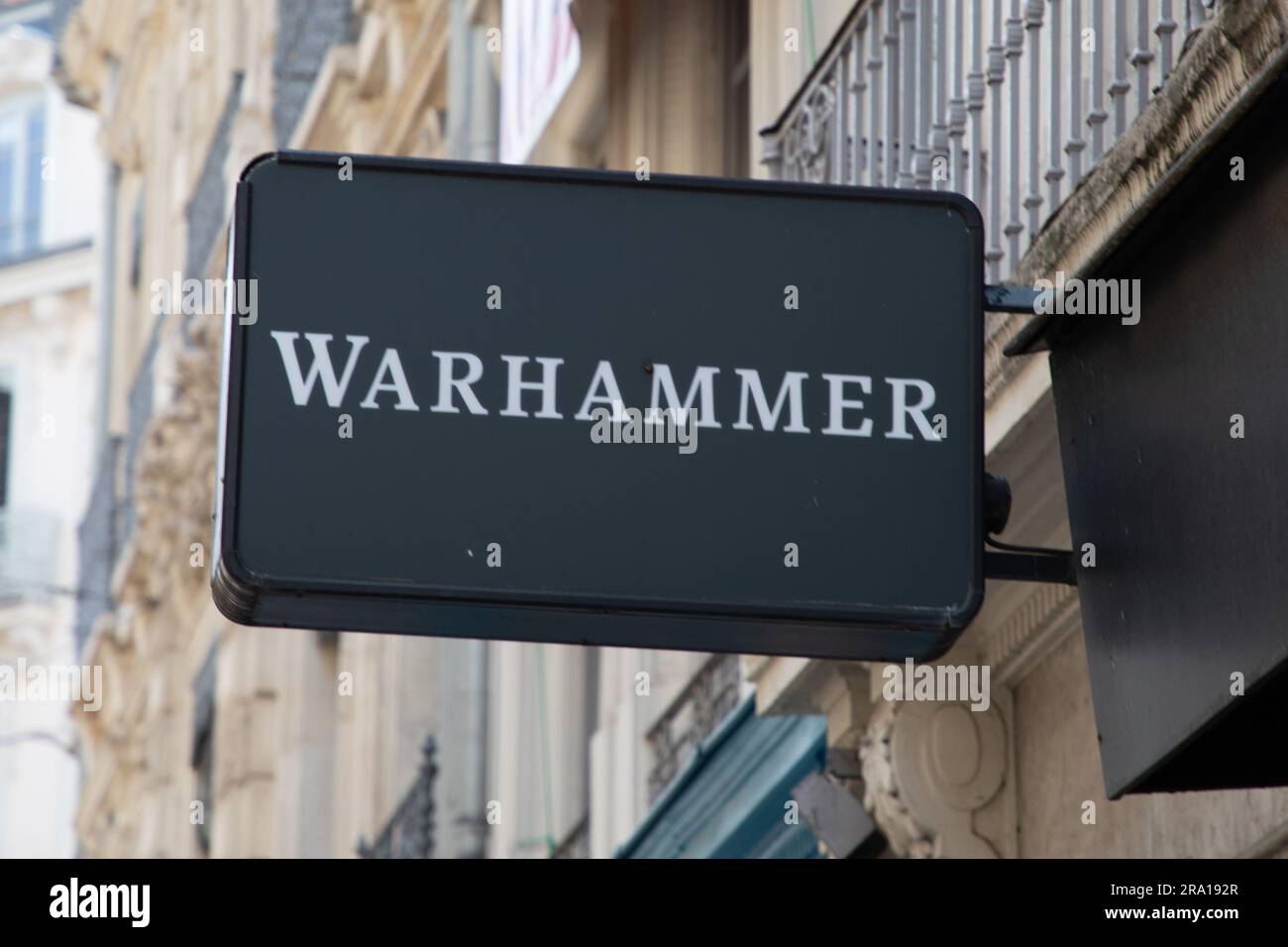 annecy , France - 06 16 2023 : Warhammer text sign facade store and logo brand wall shop specialist retail toys chain fantasy board games Stock Photo