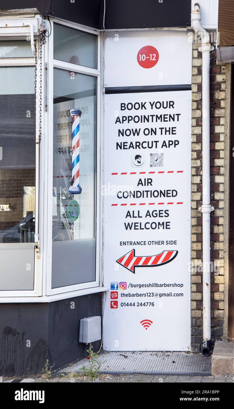 sign outside one of the many barbers in Burgess hill  West Sussex Stock Photo