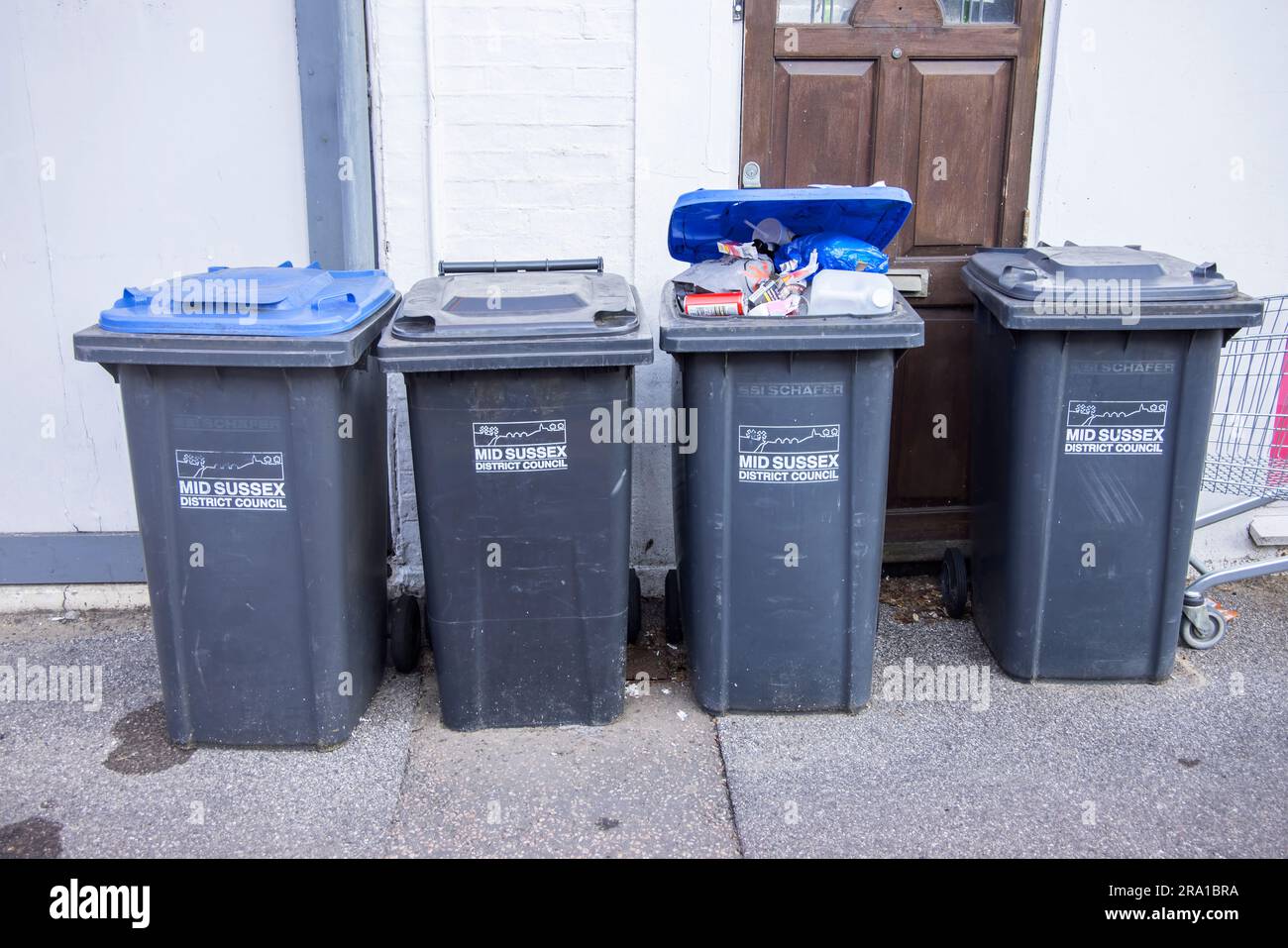overflowing rubbish bins in Burgess hill Mid Sussex Stock Photo