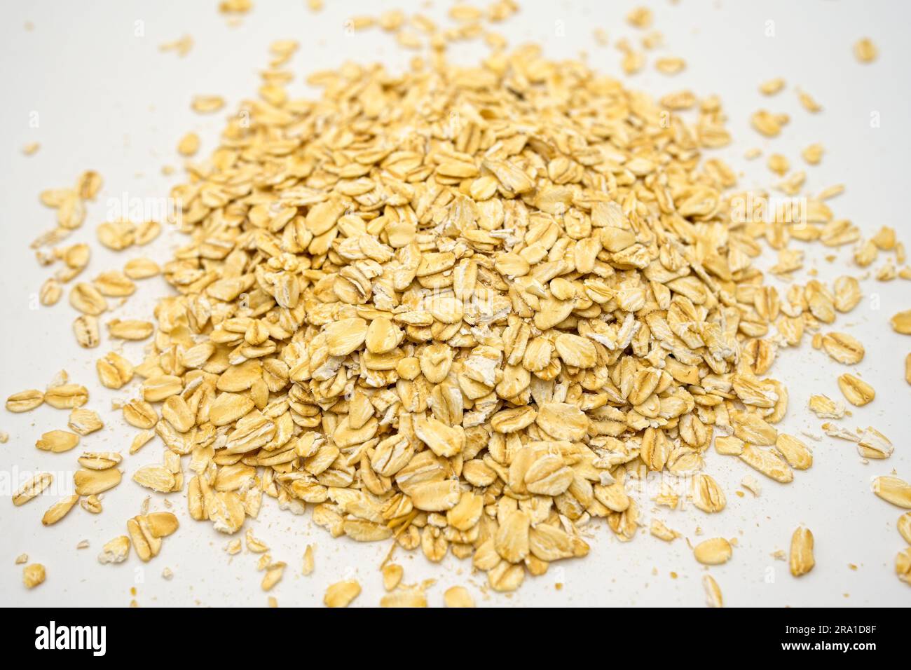 A Pile Of Oats On White Background Stock Photo Alamy