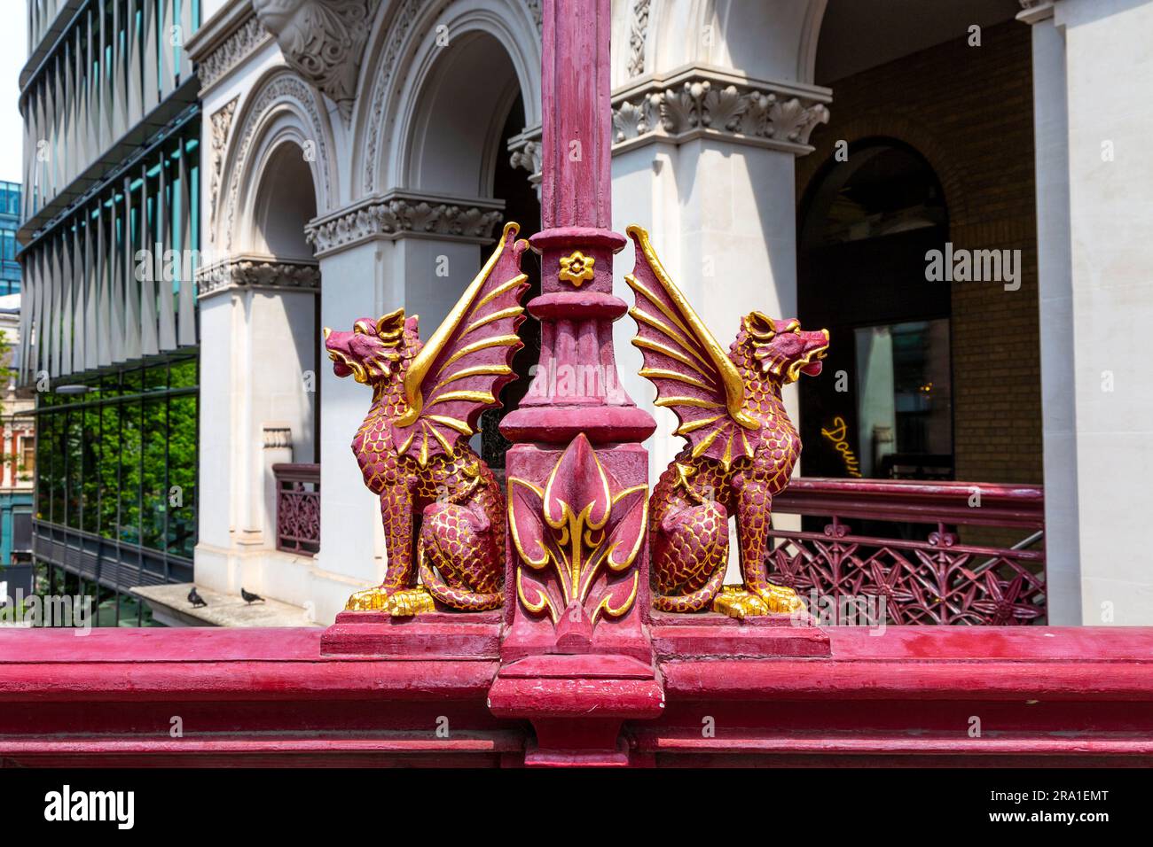 Red and gold dragons guarding a street lamp on the Holborn Viaduct, London, England, UK Stock Photo