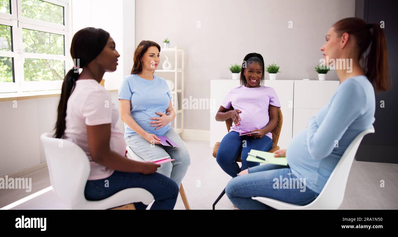 Pregnant Expecting Women Group Class. Pregnancy And Maternity Stock