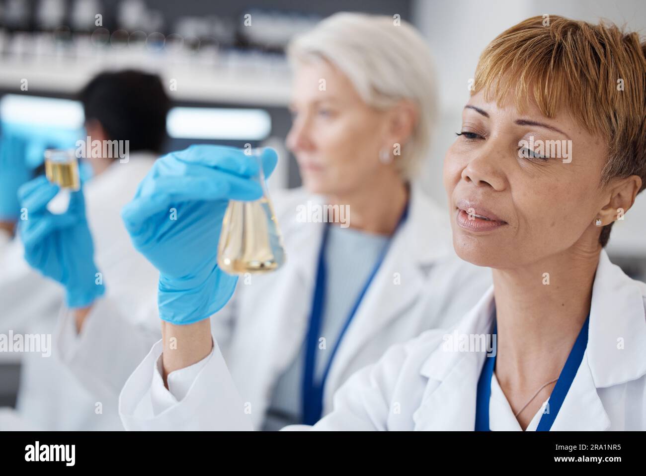 Essential oil, development and scientist in a lab doing research 