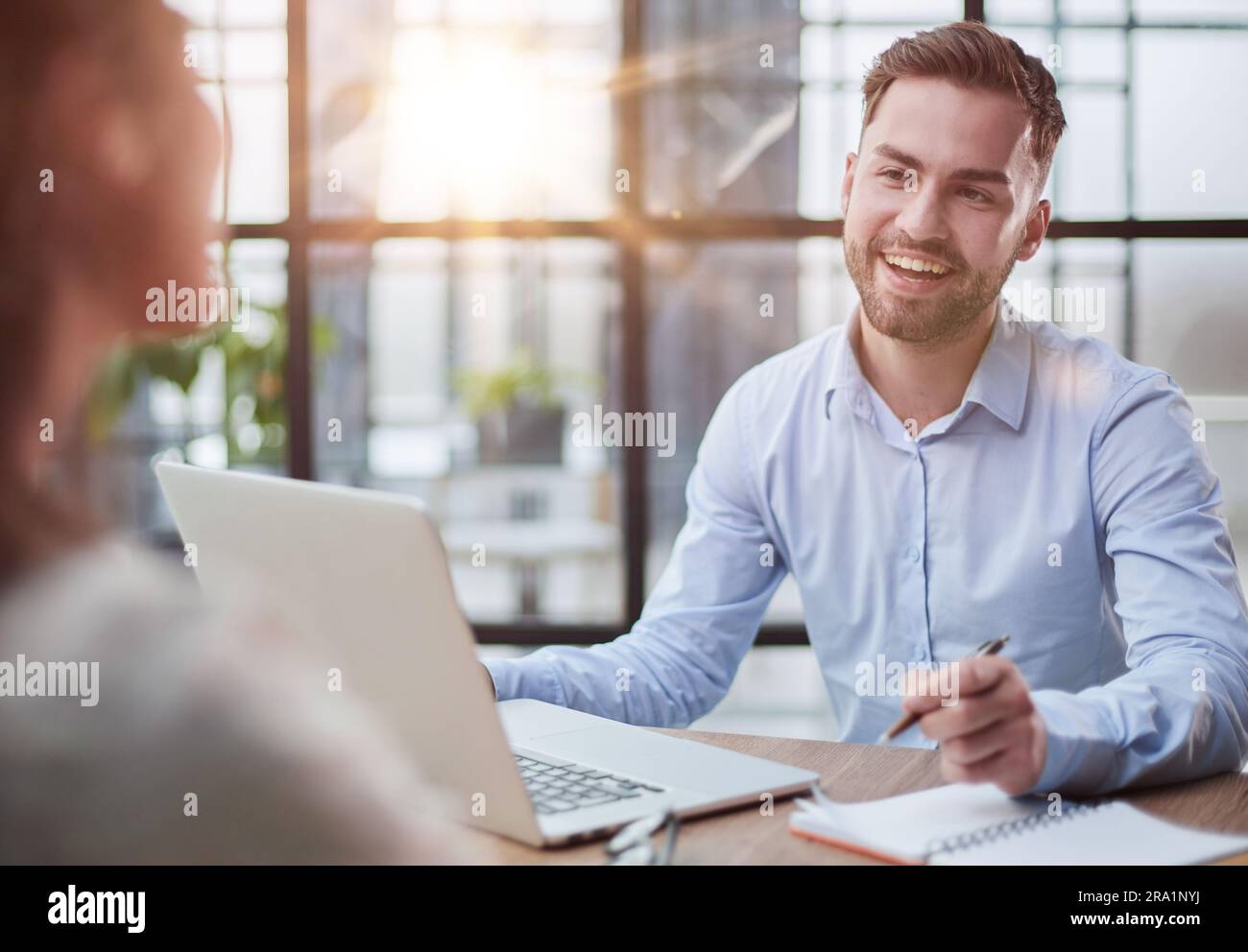 Handsome bearded man in a modern office Stock Photo