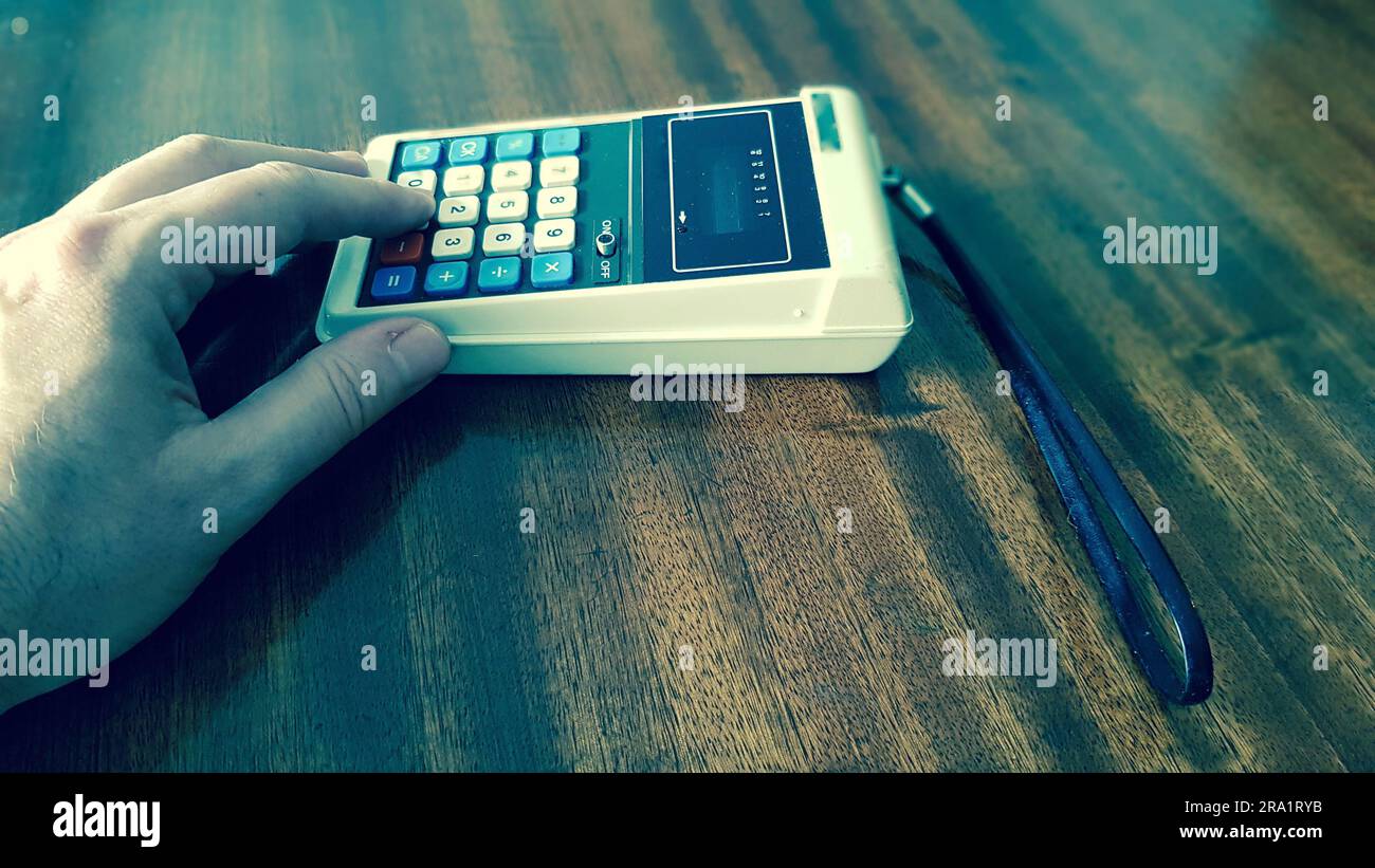 Antique calculator from the 70s vintage Stock Photo Alamy
