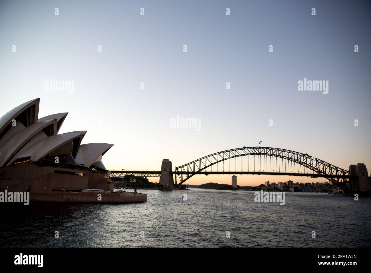 Sydney Harbour Bridge and Opera House at Sunset Stock Photo - Alamy