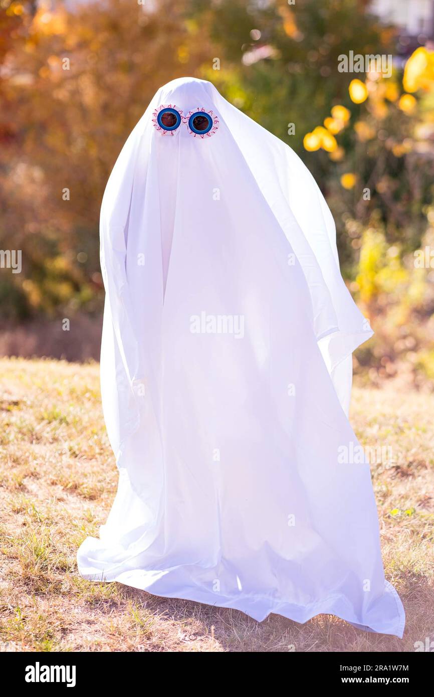 Halloween Ghost with funny glasses Stock Photo