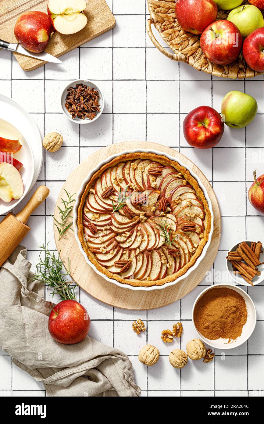 Apple pie. Apple tart with cinnamon, walnuts and pecan nuts, top view Stock Photo