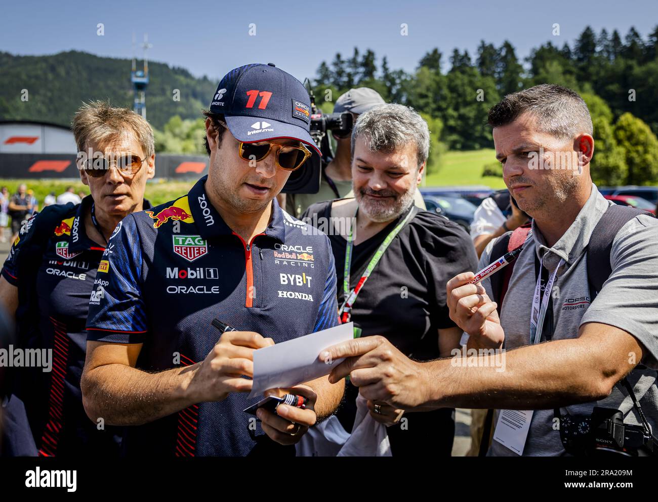 SPIELBERG - 30/06/2023, Sergio Perez (Red Bull Racing) arrives ahead of the  first free practice session ahead of the Austrian Grand Prix at the Red  Bull Ring on June 30, 2023 in