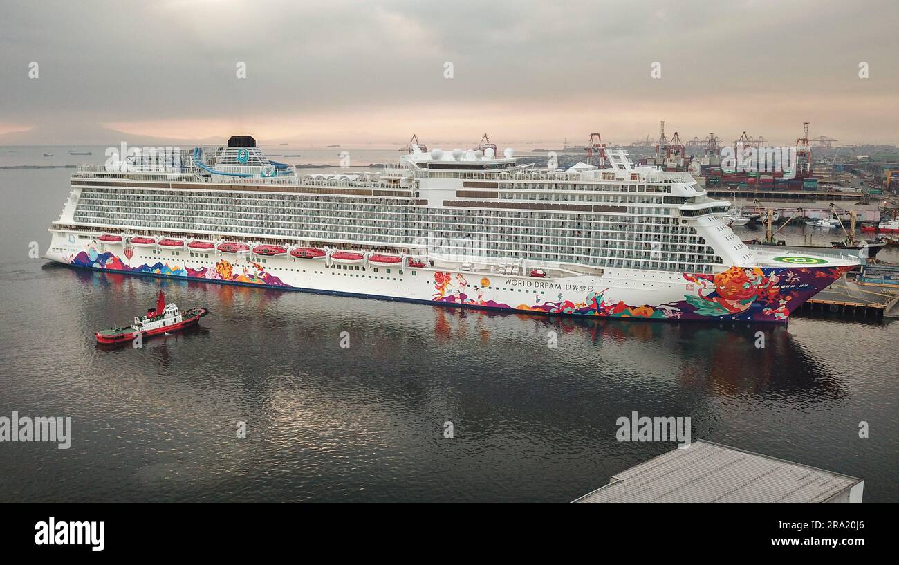 Aerial drone view of the giant cruise ship World Dream docked in Manila port, harbor, bay, Philippines. 2023: MS Manara (Cruise Saudi / Aroya Cruises) Stock Photo