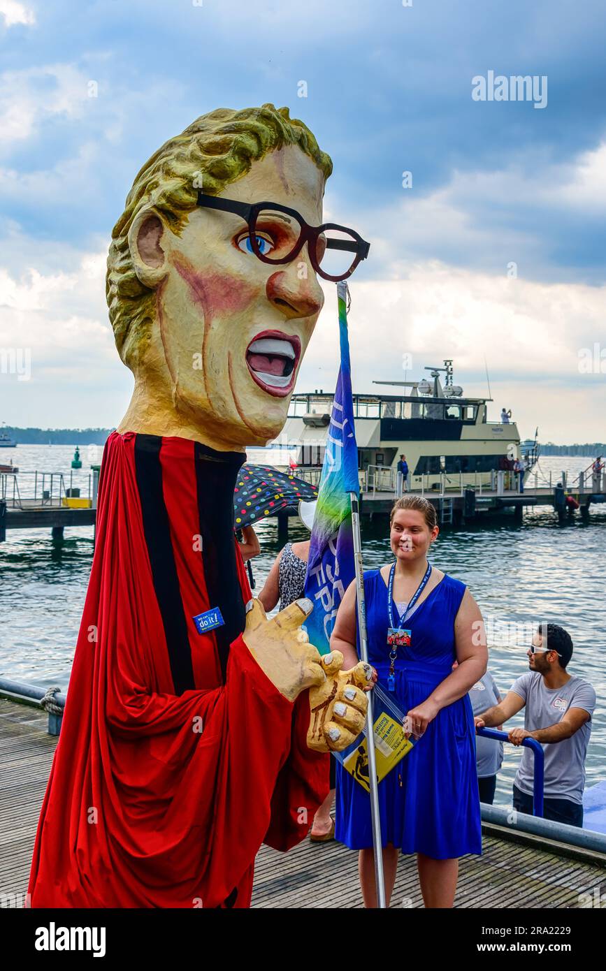 paper-mache caricature of Kathleen Wynne. Torch Relay Event in the waterfront district. Pan American Games Toronto 2015 Stock Photo
