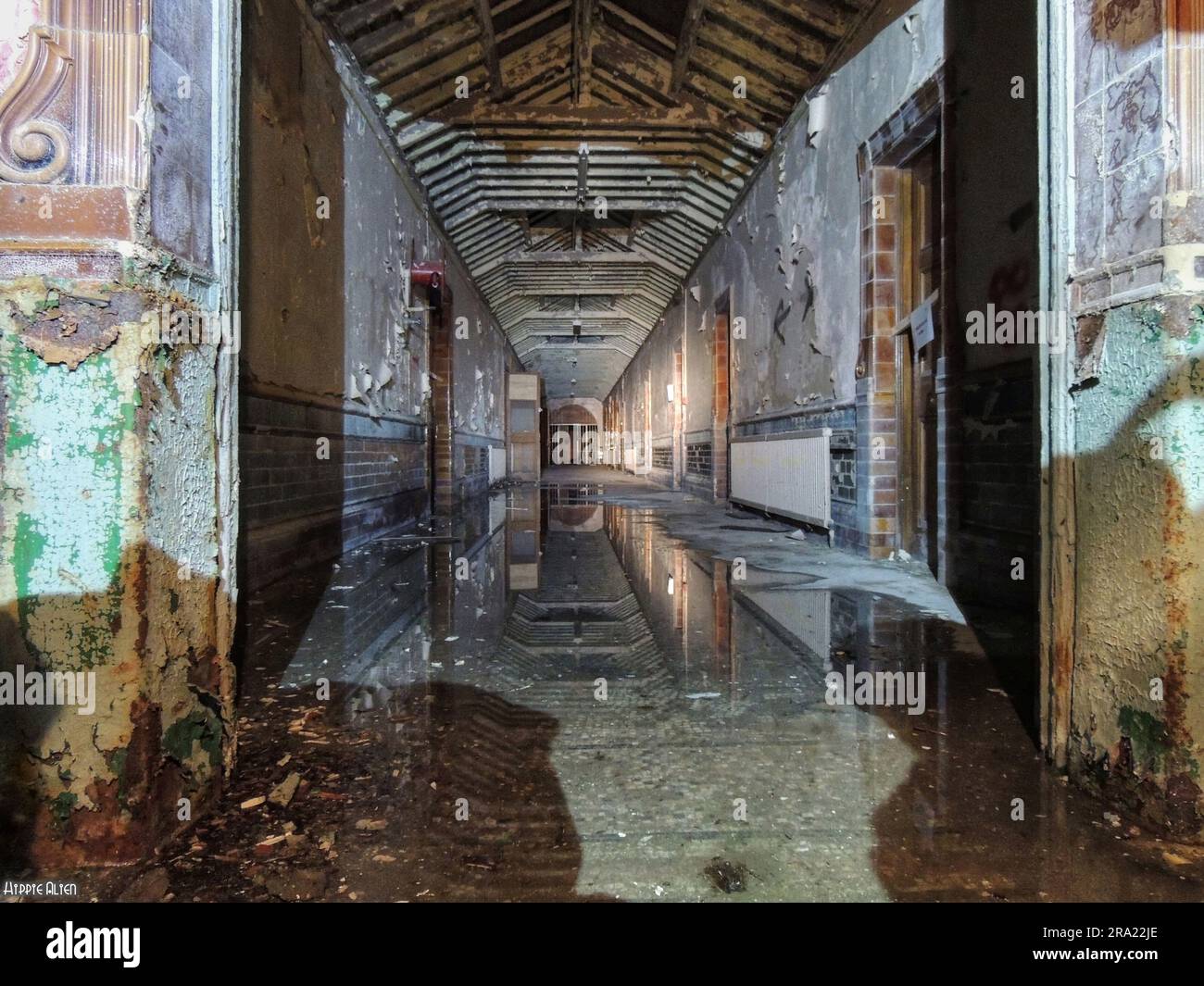 The ceiling reflected in a pool of water. WEST YORKSHIRE; UK CHILLING