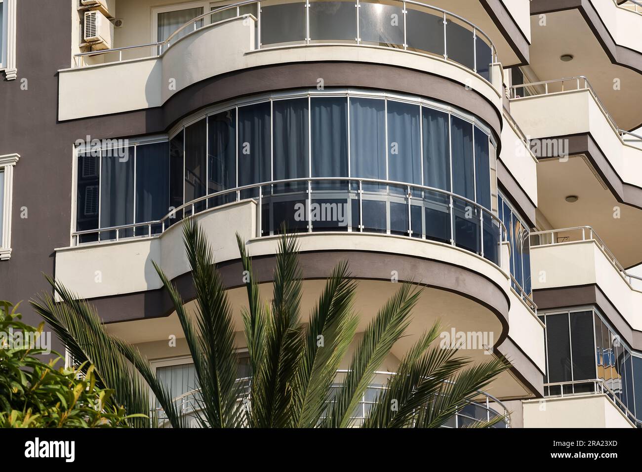 Glazed balcony in an apartment building. Building exterior Stock Photo ...