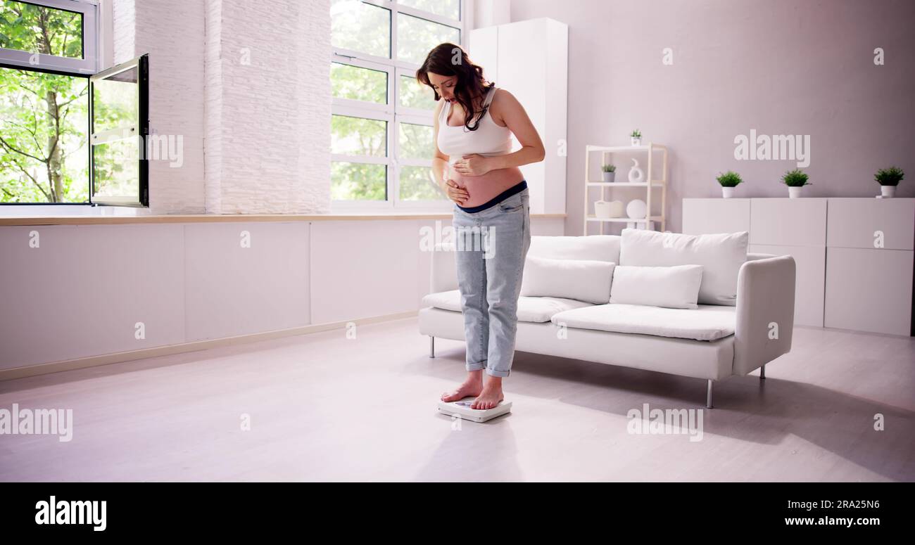 Shocked Pregnant With Body Weight Gain Food And Diet Stock Photo Alamy Shocked Pregnant With Body Weight Gain Food And Diet Stock Photo Alamy