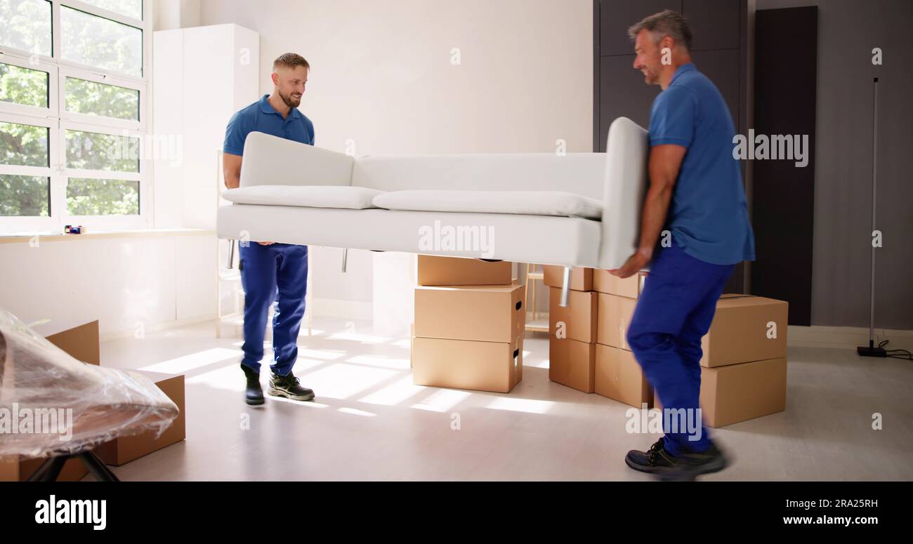 Professional Furniture Mover And Delivery. Moving Couch Stock Photo Alamy