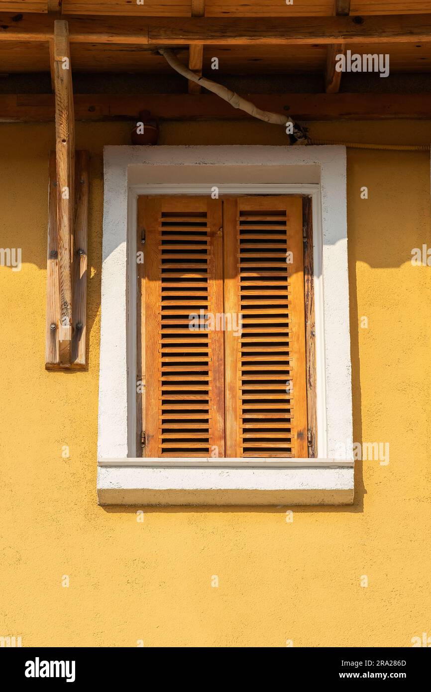 Wooden panels with window on house facade hi-res stock photography and ...
