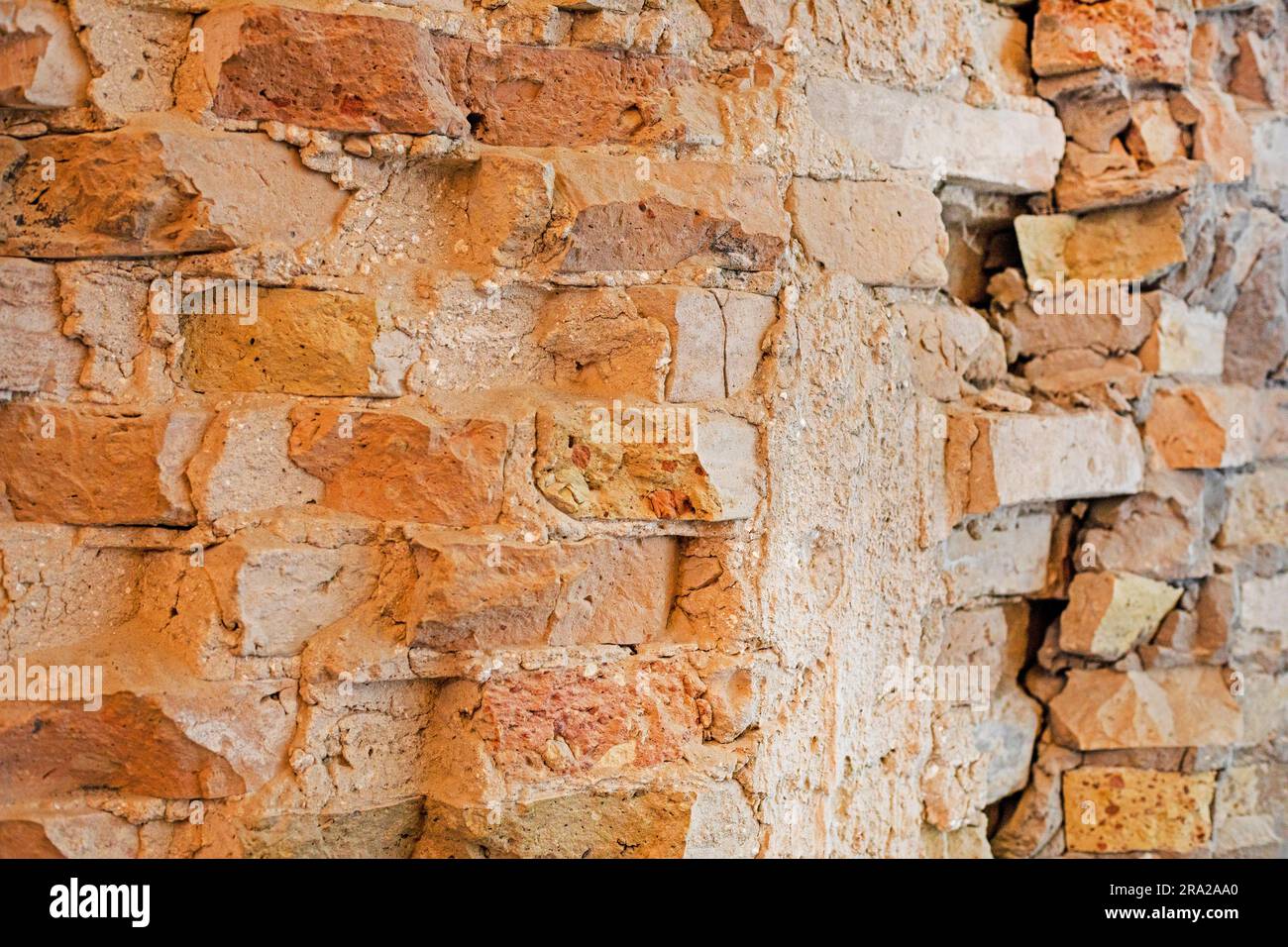 abstract background vintage masonry brick wall of past centuries Stock