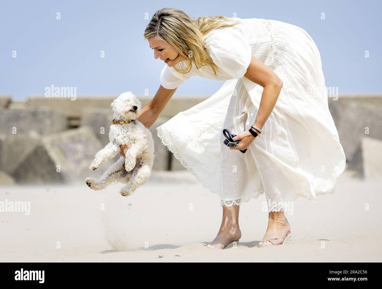 30th June 2023. The Hague, Netherlands. THE HAGUE - Queen Maxima with dog Mambo on the Zuiderstrand during the traditional photo session of the royal family. ANP KOEN VAN WEEL netherlands out - belgium out Credit: ANP/Alamy Live News Stock Photo