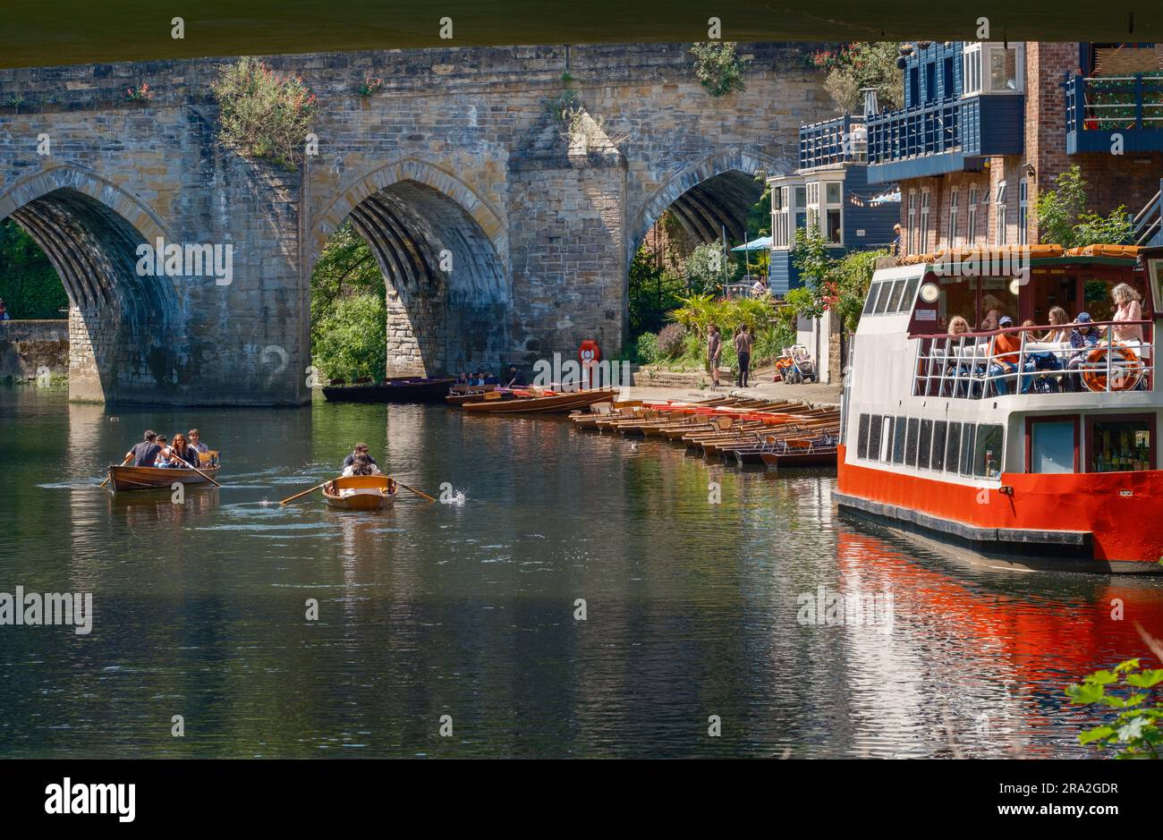 Prince Bishop River Cruiser and Browns Rowing Boats on the River Wear at Elvet Bridge Durham Stock Photo
