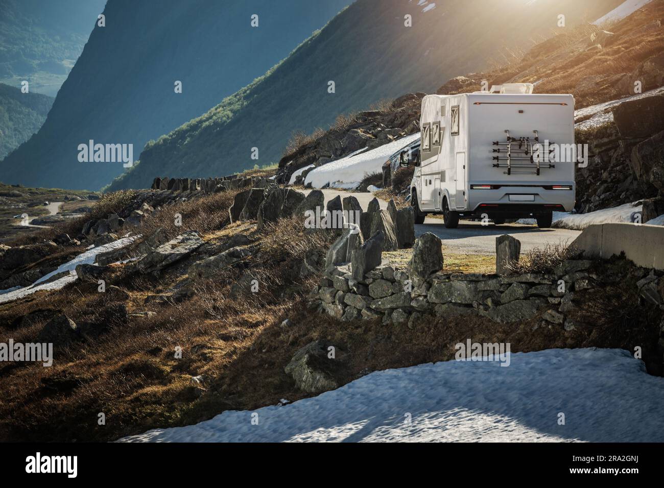 Recreational Vehicle RV Camper Van on a Scenic Mountain Road Somewhere ...