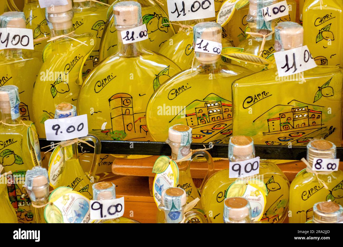 https://c8.alamy.com/comp/2RA2JJD/shop-selling-locally-produced-bottles-of-limoncello-liqueur-on-the-island-of-capri-in-the-tyrrhenian-sea-off-the-sorrento-peninsula-italy-2RA2JJD.jpg