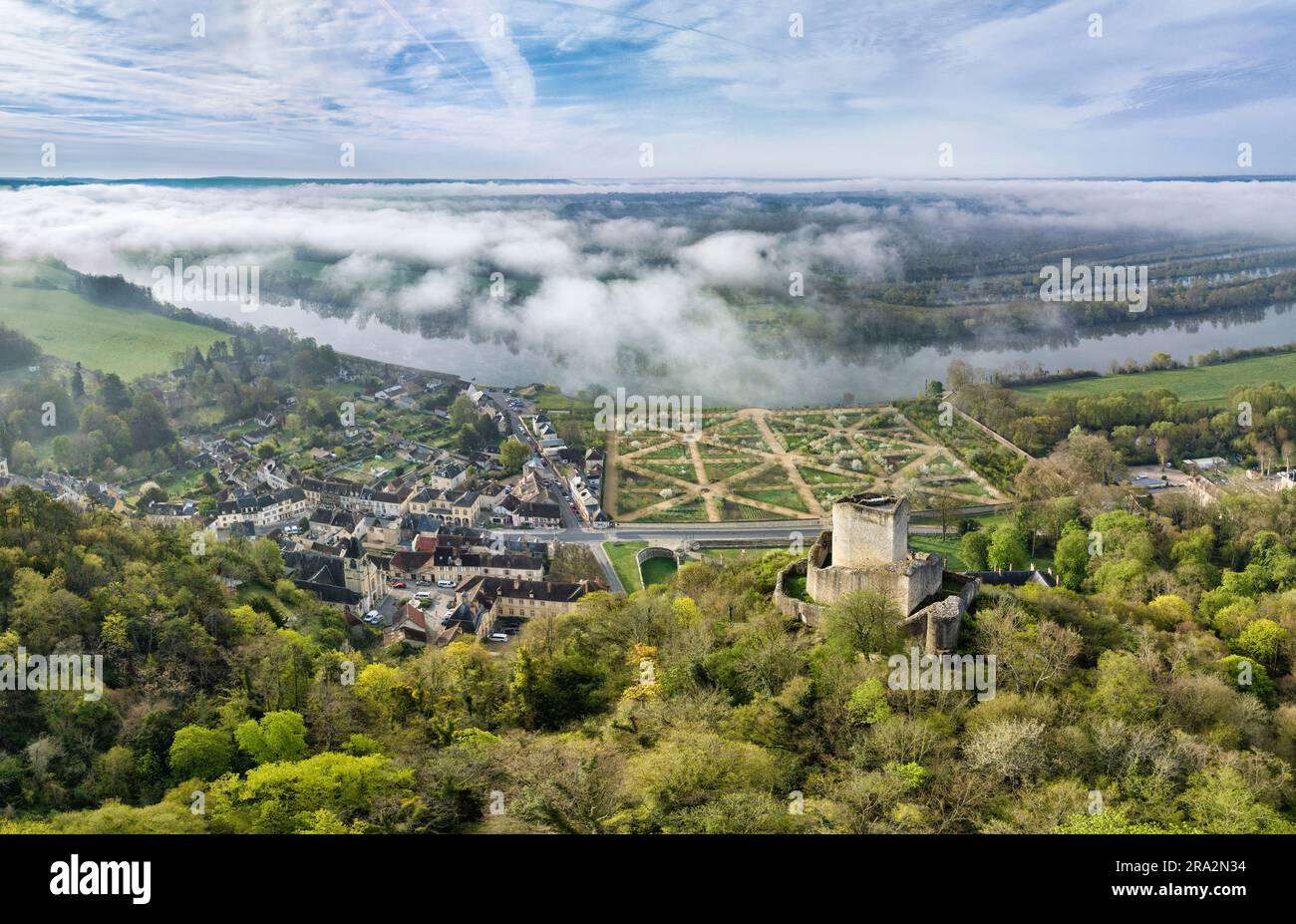 France, Val d'Oise, La Roche Guyon, labeled The Most Beautiful Villages of France, the castle and its garden along the Seine, the dungeon of the twelfth century (aerial view) Stock Photo