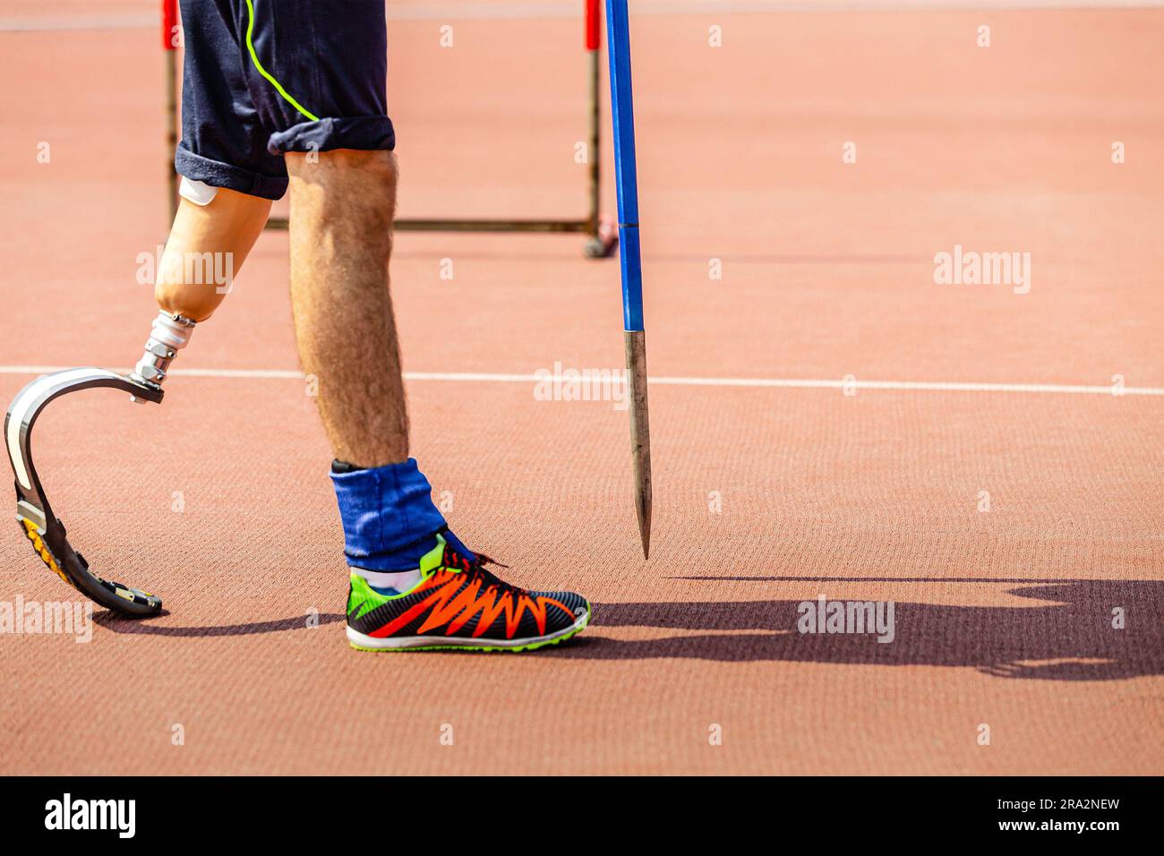 leg on prosthesis male athlete with spear at athletics championships, summer para sports games Stock Photo