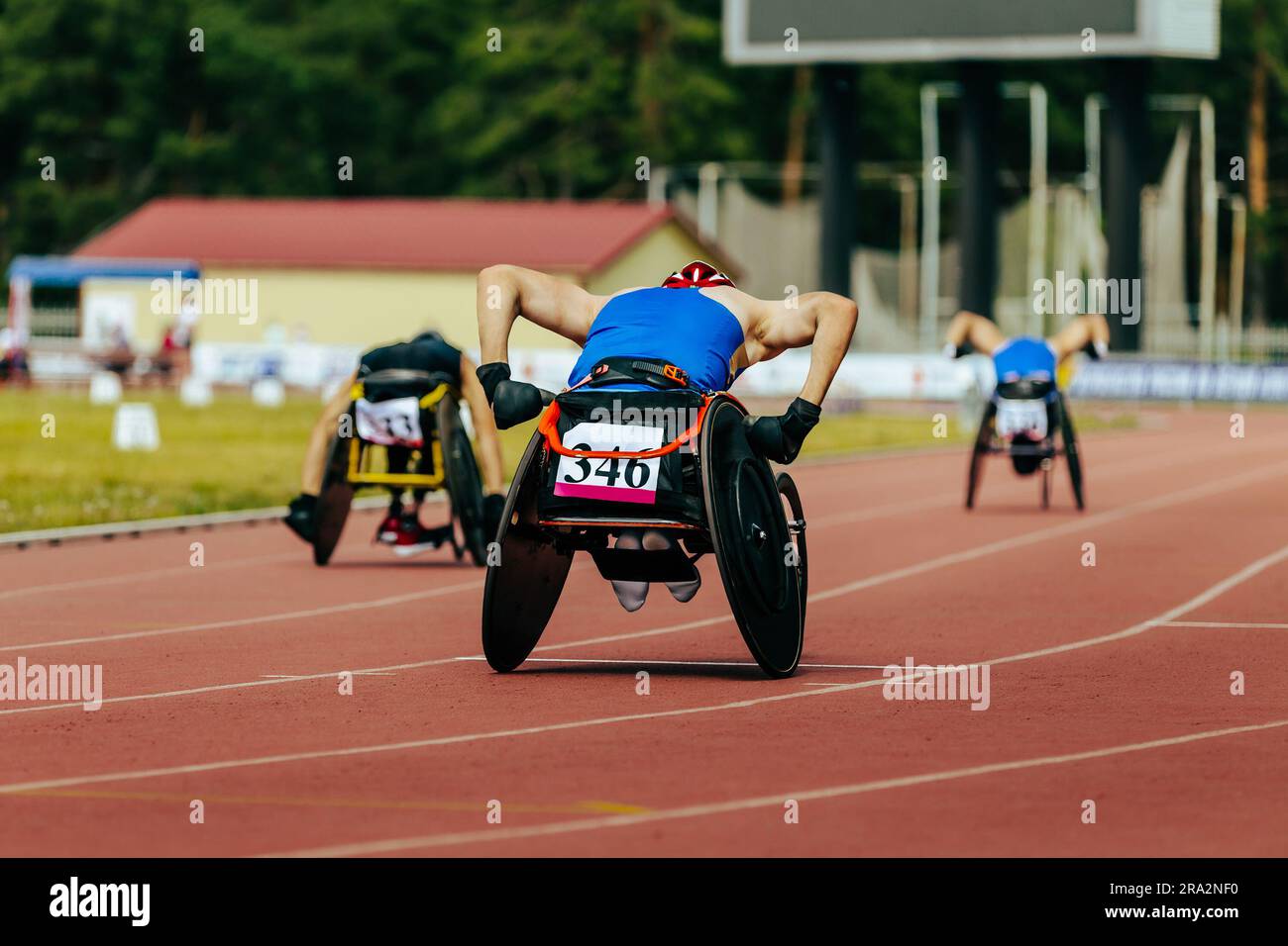 group athletes in wheelchair racing race track stadium in para athletics championship, summer sports games Stock Photo