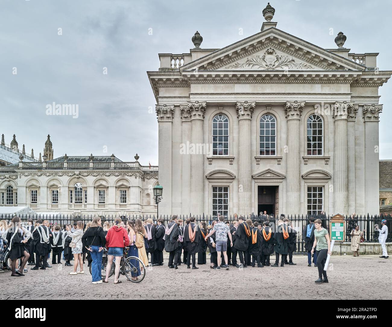 Students from Emmanuel College, University of Cambridge, England, wait to process into Senate House for their graduation award ceremony on Friday 30 June 2023. Stock Photo